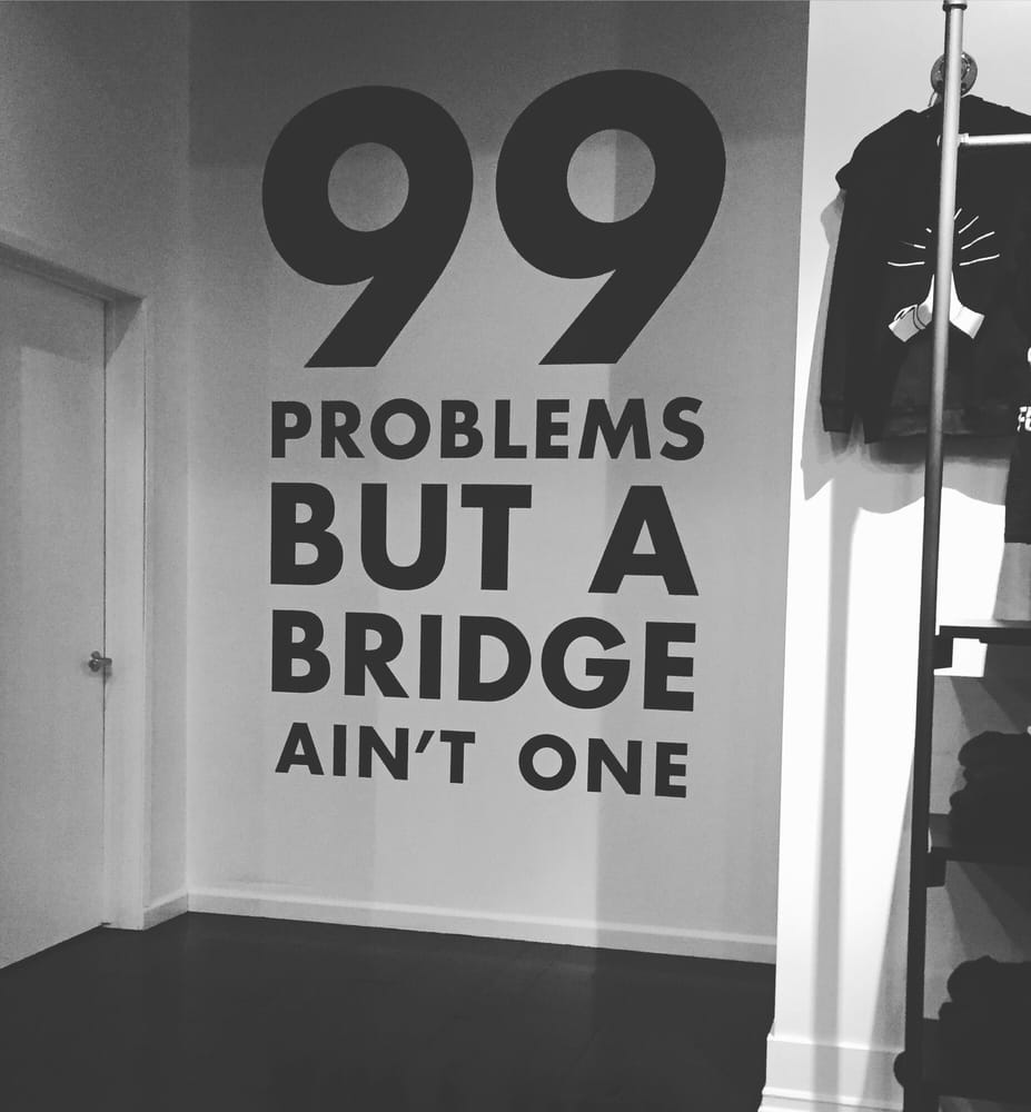 Wall that says 99 Problems but a bridge ain't one at Y7