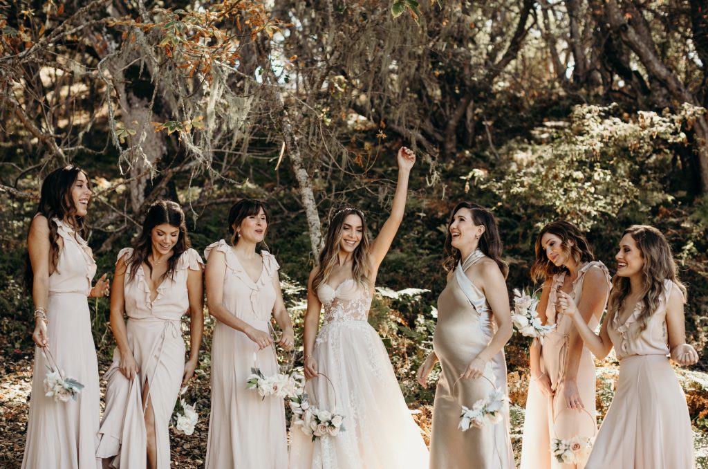 Erin and her bridal party laughing