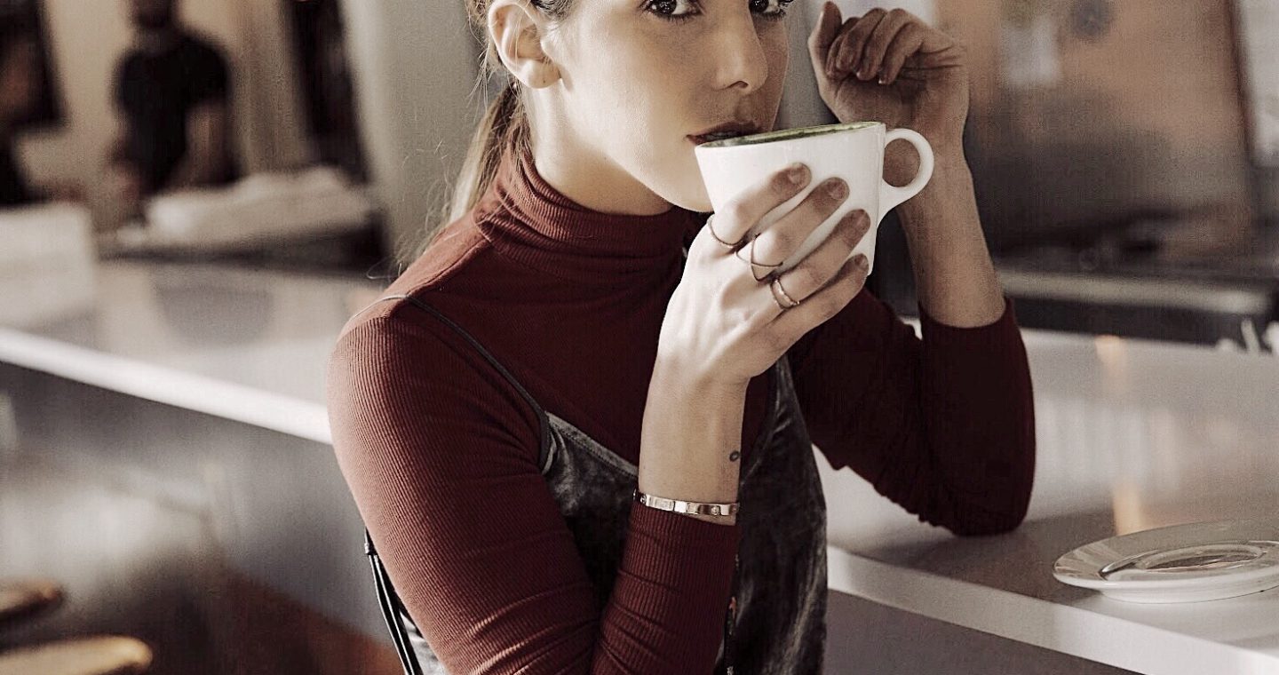 Erin drinking coffee